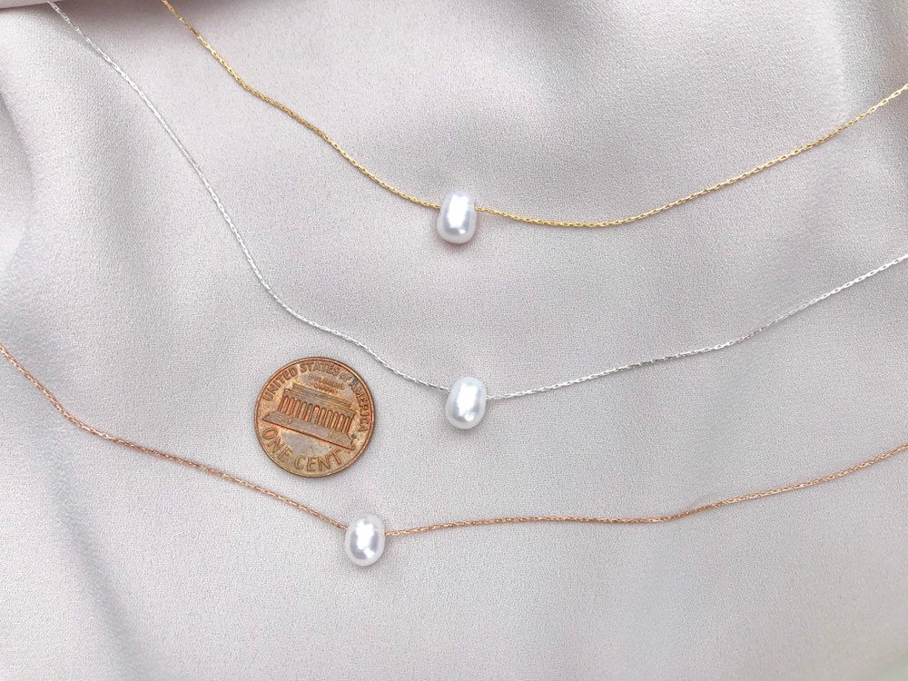 Floating pearl necklace. Hand made with freshwater pearls and gold filled  chain. Tarnish resistance and water proof. #minimalfashion #min... |  Instagram